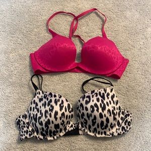 2 bras, pink in very good condition, black and white is in decent condition.